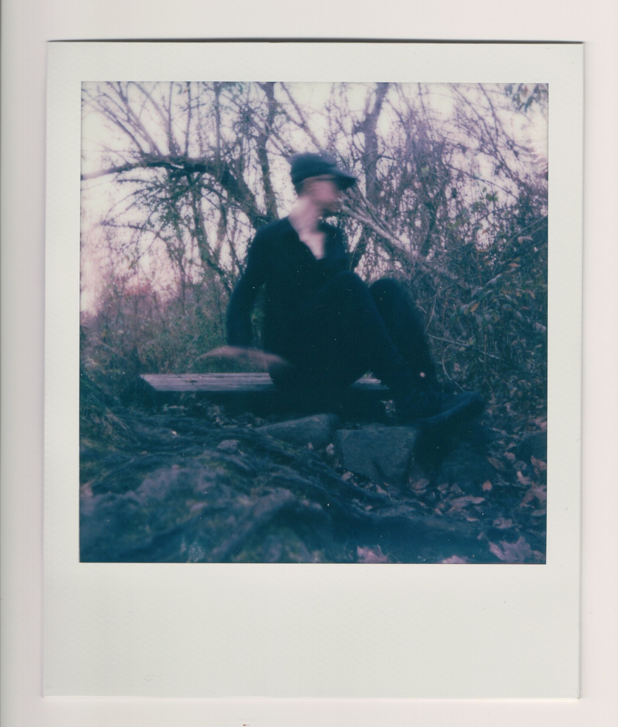 A Polaroid photo of Chris Amandier in the Salem Woods